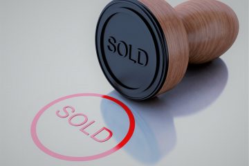 3D Illustration. Stamp sold with red text. Isolated white background.
